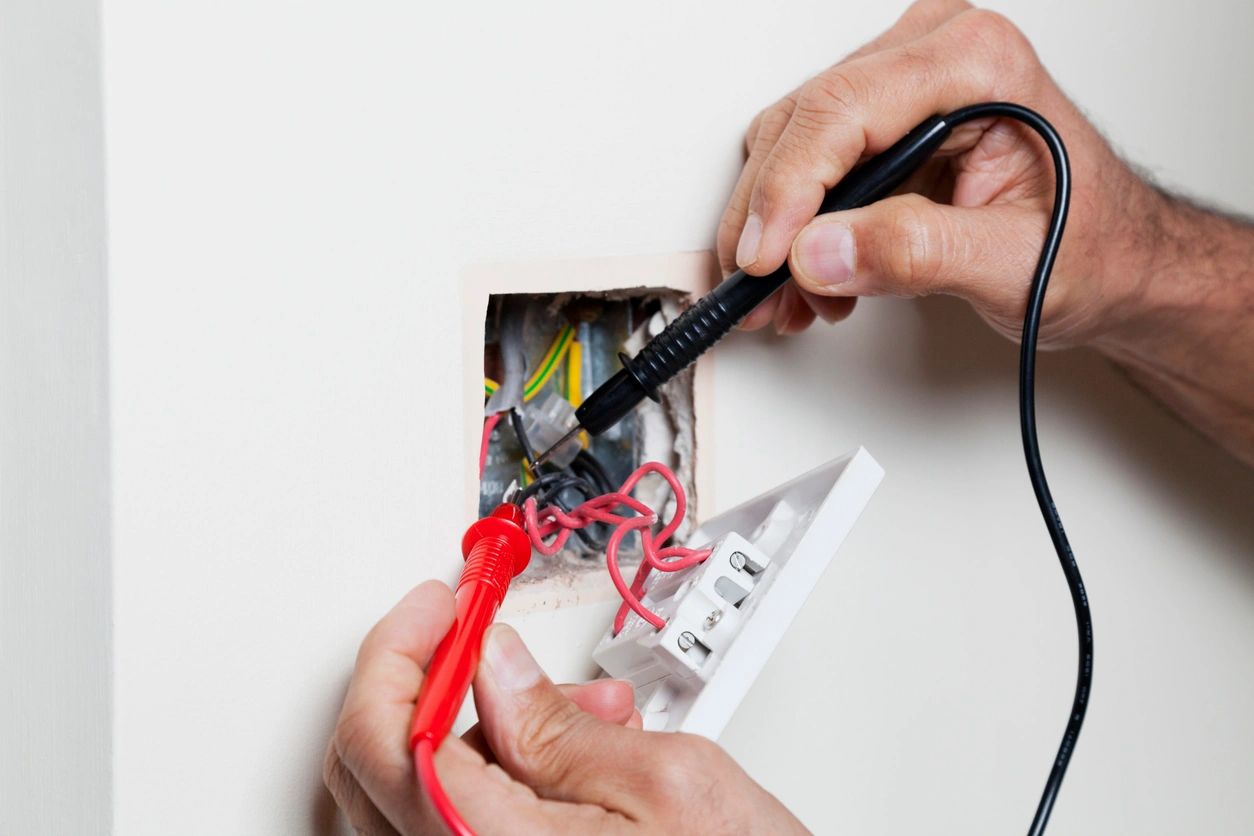 A residential electrician working on a home in San Francisco, CA